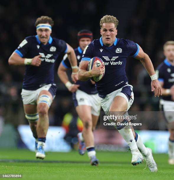 Duhan van der Merwe of Scotland breaks with the ball to score his first and Scotland's second try during the Six Nations Rugby match between England...