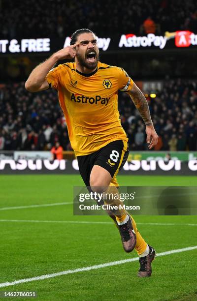 Ruben Neves of Wolverhampton Wanderers celebrates after scoring the team's third goal during the Premier League match between Wolverhampton Wanderers...