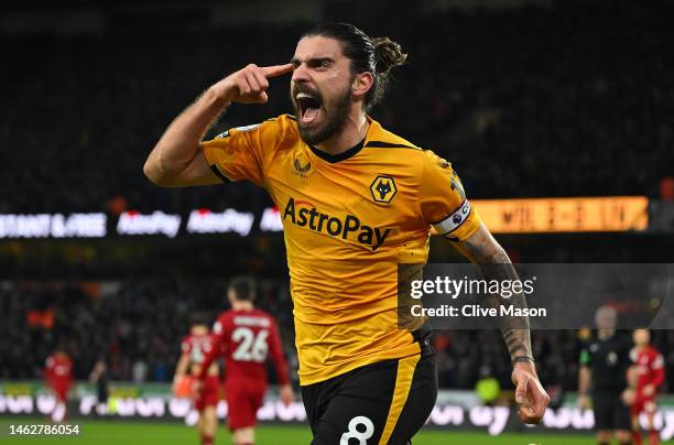 Ruben Neves of Wolverhampton Wanderers celebrates after scoring the team's third goal during the Premier League match between Wolverhampton Wanderers...