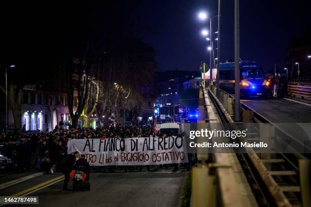 Demonstrators hold a banner reading “Al fianco di Alfredo” during a protest against the prison conditions of Alfredo Cospito on February 1, 2023 in...