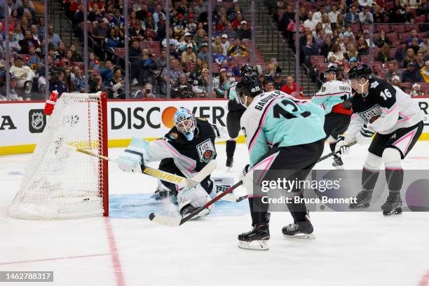 Johnny Gaudreau of the Columbus Blue Jackets scores a goal on Linus Ullmark of the Boston Bruins during the 2023 NHL All-Star Game between the...