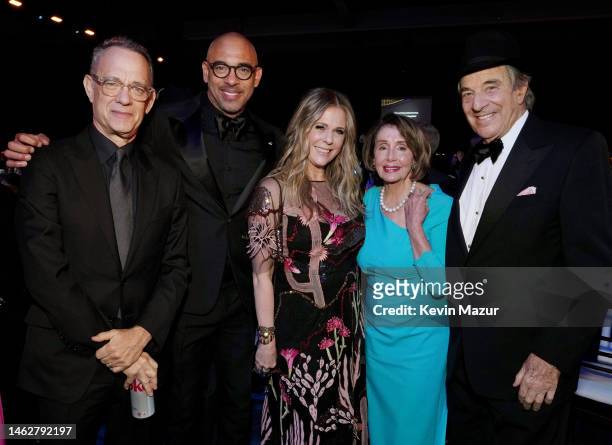 Tom Hanks, CEO of the Recording Academy and MusiCares Harvey Mason jr., Rita Wilson, U.S. Representative Nancy Pelosi, and Paul Pelosi attend...