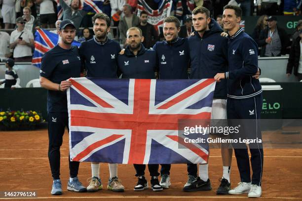 Players of team Great Britain pose for pictures after defeating Colombian team during the Round 1 of Qualifiers of Davis Cup 2023 at Pueblo Viejo...