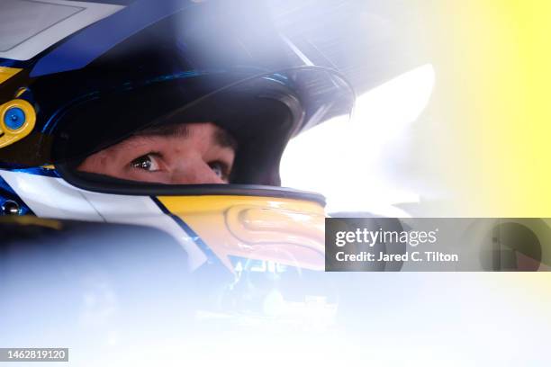 Chase Elliott, driver of the NAPA Auto Parts Chevrolet, sits in his car during practice for the NASCAR Clash at the Coliseum at Los Angeles Coliseum...