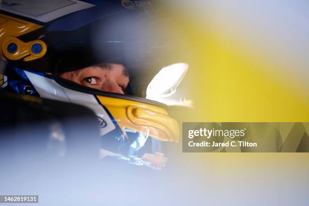 Chase Elliott, driver of the NAPA Auto Parts Chevrolet, sits in his car during practice for the NASCAR Clash at the Coliseum at Los Angeles Coliseum...