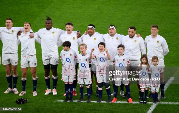 The England team sing the National anthem during the Six Nations Rugby match between England and Scotland at Twickenham Stadium on February 04, 2023...