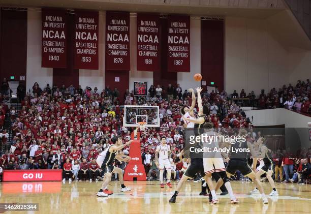 The opening tip of the Indiana Hoosiers game against the Purdue Boilermakers at Simon Skjodt Assembly Hall on February 04, 2023 in Bloomington,...