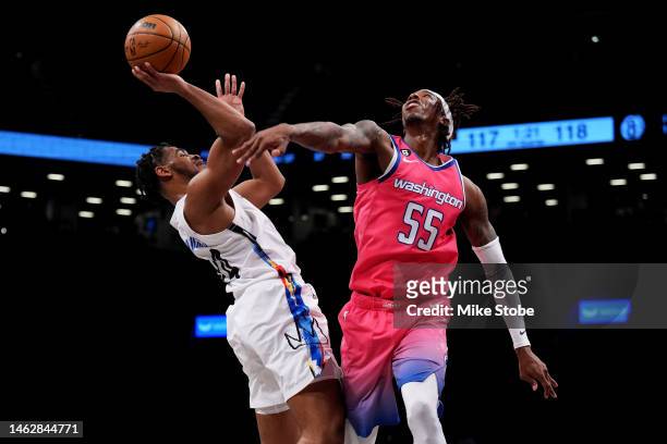 Cam Thomas of the Brooklyn Nets drives to the basket against Delon Wright of the Washington Wizards at Barclays Center on February 04, 2023 in New...