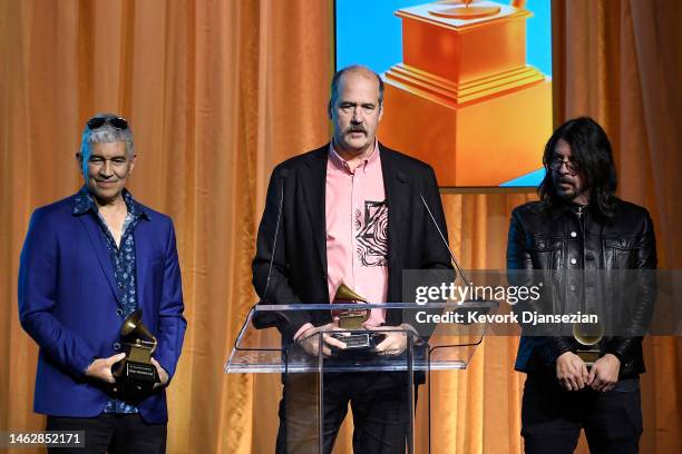 Lifetime Achievement Award honorees Pat Smear, Krist Novoselic and Dave Grohl speak onstage during the Recording Academy's 2023 Special Merit Awards...