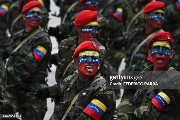 Soldiers of the Venezuelan Army march during a rehearsal parade within the framework of the Independence Day celebrations at the Fort Tiuna in...