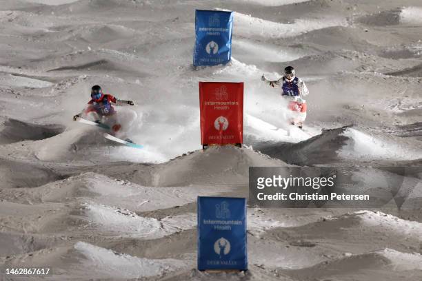 Yuki Kajiwara of Team Japan and Maia Schwinghammer of Team Canada compete in the Women's Dual Moguls Finals on day three of the Intermountain...