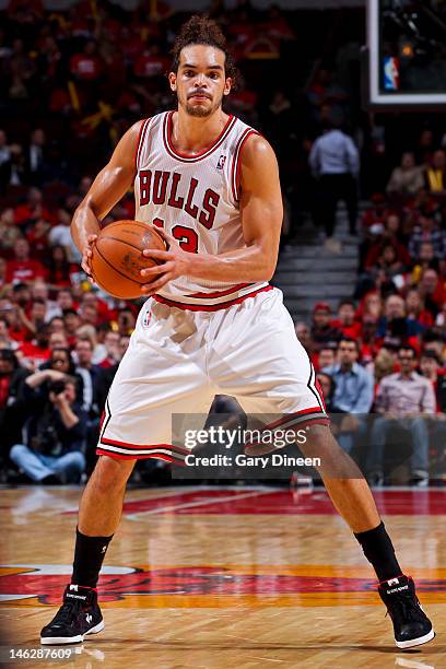 Joakim Noah of the Chicago Bulls controls the ball against the Philadelphia 76ers in Game Two of the Eastern Conference Quarterfinals during the 2012...