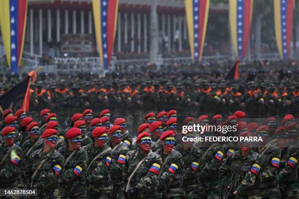 Soldiers of the Venezuelan Army march during a rehearsal parade within the framework of the Independence Day celebrations at the Fort Tiuna in...