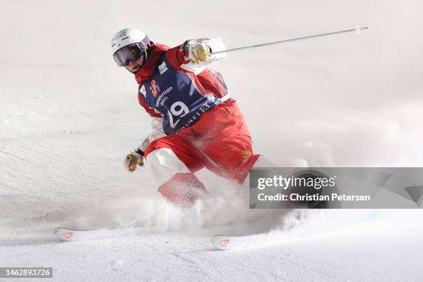 Goshin Fujiki of Team Japan finishes his match against William Feneley of Team Great Britain during the Men's Dual Moguls Finals on day three of the...