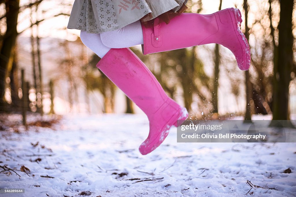 Jumping with pink boots