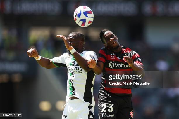 Yeni Ngbakoto of the Wanderers and Tongo Doumbia of United compete for a header during the round 15 A-League Men's match between Western Sydney...