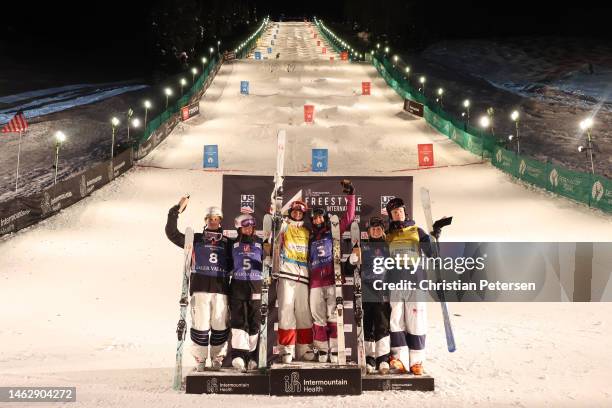 Second place finishers Matt Graham of Team Australia and Jaelin Kauf of Team United States, first place finishers Mikael Kingsbury of Team Canada and...