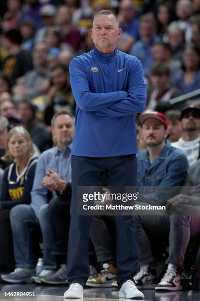 Head coach Michael Malone of the Denver Nuggets watches as his team plays the Atlanta Hawks in the first quarter at Ball Arena on February 4, 2023 in...