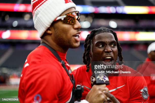 Wide receiver Tyreek Hill of the Miami Dolphins reacts as he is interviewed by AFC cornerback Marlon Humphrey of the Baltimore Ravenss during a...