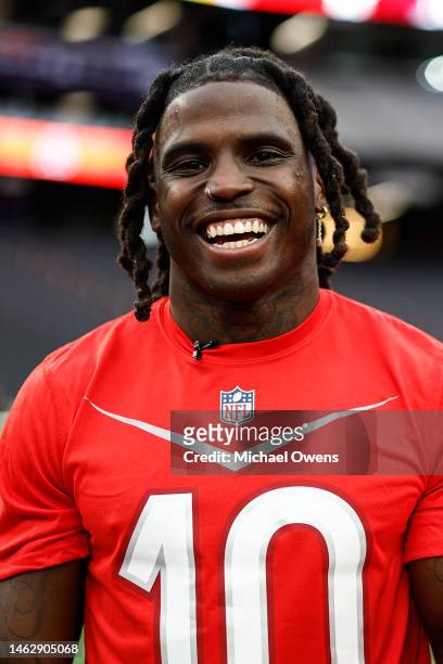Wide receiver Tyreek Hill of the Miami Dolphins reacts during a practice session prior to an NFL Pro Bowl football game at Allegiant Stadium on...