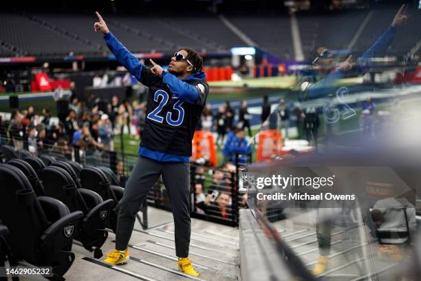 Cornerback Jaire Alexander of the Green Bay Packers reacts as he walks to his spot during a group portrait prior to an NFL Pro Bowl football game at...