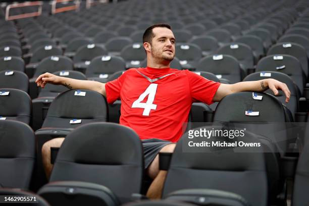 Quarterback Derek Carr of the Las Vegas Raiders reacts as he takes a seat during a group portrait prior to an NFL Pro Bowl football game at Allegiant...