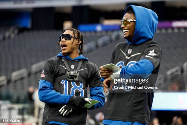 Wide receiver Justin Jefferson of the Minnesota Vikings and NFC wide receiver CeeDee Lamb of the Dallas Cowboys react during a practice session prior...