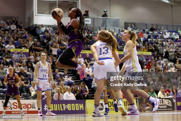 Tiffany Mitchell of the Boomers drives to the basket during the round 13 WNBL match between Melbourne Boomers and Bendigo Spirit at Melbourne Sports...