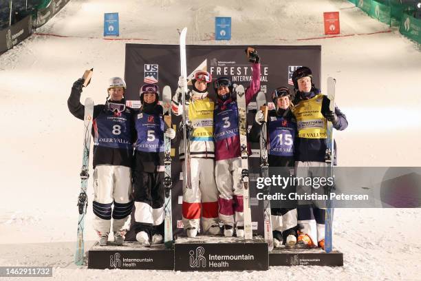 Second place finishers Matt Graham of Team Australia and Jaelin Kauf of Team United States, first place finishers Mikael Kingsbury of Team Canada and...