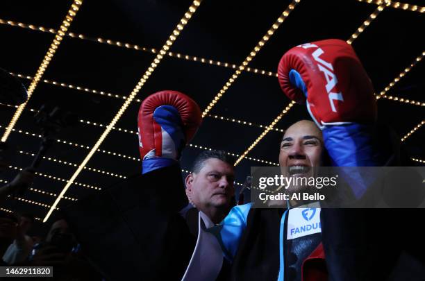 Amanda Serrano enters the ring against Erika Cruz before their fight for Serrano, WBC, WBO and IBF featherweight titles and Cruz's WBA featherweight...