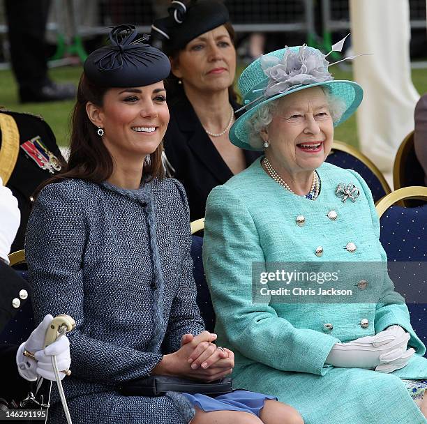 Catherine, Duchess of Cambridge and Queen Elizabeth II smile as they visit Vernon Park during a Diamond Jubilee visit to Nottingham on June 13, 2012...