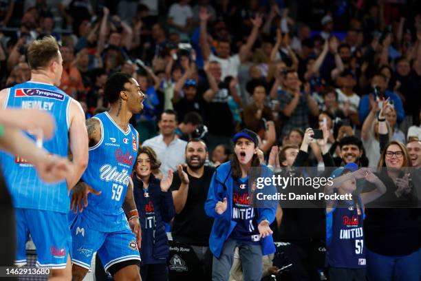 Rayjon Tucker of United celebrates the final basket with United fans after winning the round 18 NBL match between Melbourne United and Adelaide 36ers...
