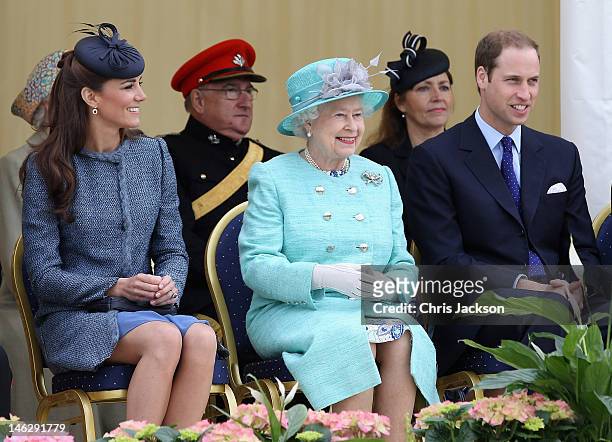 Catherine, Duchess of Cambridge, Prince William, Duke of Cambridge and Queen Elizabeth II smile as they visit Vernon Park during a Diamond Jubilee...