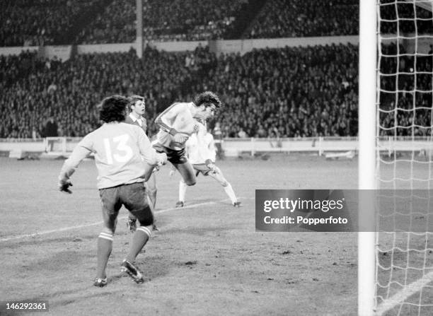 Malcolm Macdonald of England scores his fifth goal of the match with a header in the 87th minute during the European Championship Qualifying match...