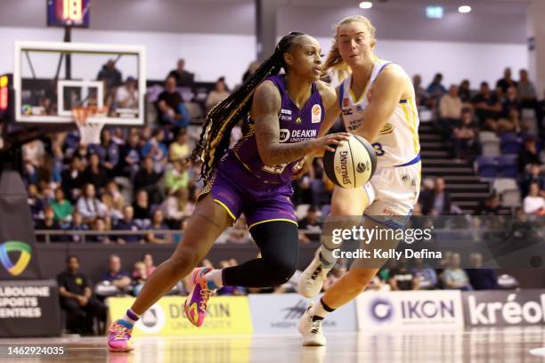 Tiffany Mitchell of the Boomers handles the ball during the round 13 WNBL match between Melbourne Boomers and Bendigo Spirit at Melbourne Sports...