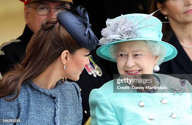 Catherine, Duchess of Cambridge and Queen Elizabeth II are seen talking during a visit to Vernon Park during a Diamond Jubilee visit to Nottingham on...