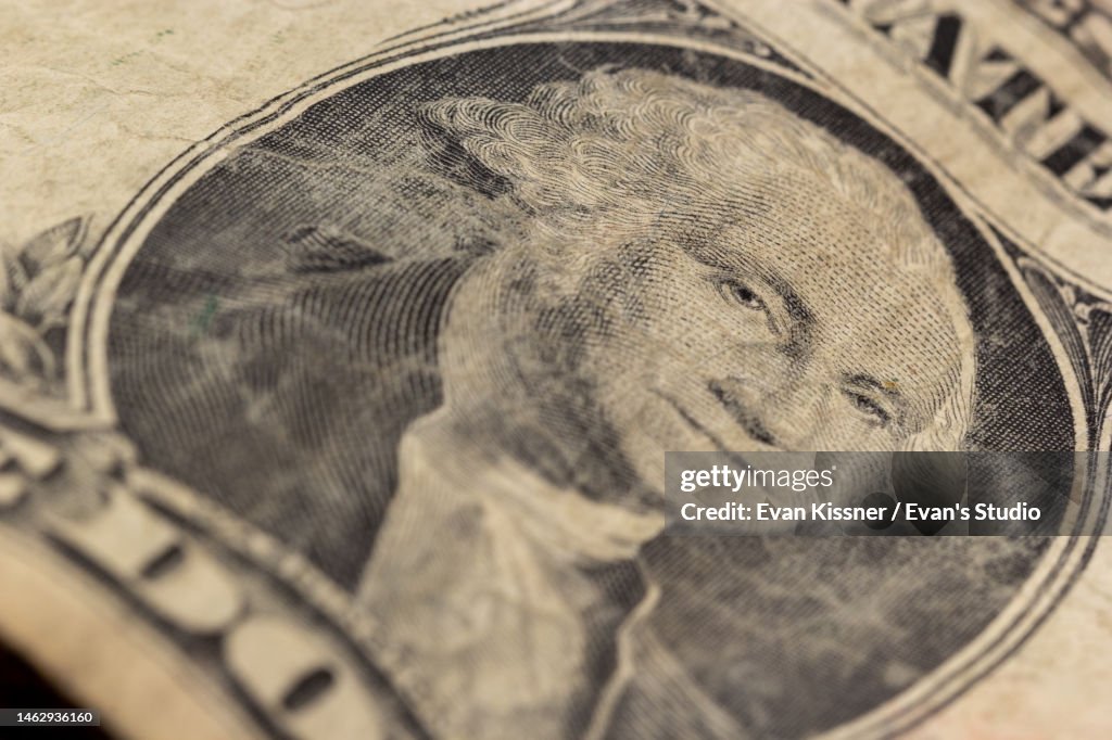 Vintage and Worn Circulated One Dollar Bill with Closeup of George Washington