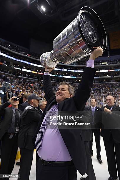 Governor Tim Leiweke of the Los Angeles Kings holds up the Stanley Cup after the Kings defeated the New Jersey Devils 6-1 to win the Stanley Cup...