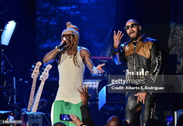 Lil Wayne and Swizz Beatz perform onstage during the Pre-GRAMMY Gala & GRAMMY Salute to Industry Icons Honoring Julie Greenwald and Craig Kallman on...