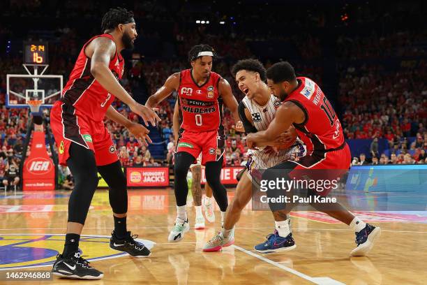 Jaylin Galloway of the Kings and Corey Webster of the Wildcats controls the ball during the round 18 NBL match between Perth Wildcats and Sydney...