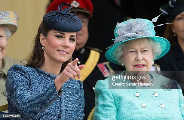 Catherine, Duchess of Cambridge and Queen Elizabeth II attend Vernon Park during a Diamond Jubilee visit to Nottingham on June 13, 2012 in...