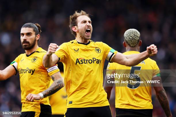 Craig Dawson of Wolverhampton Wanderers celebrates after scoring his team's second goal during the Premier League match between Wolverhampton...