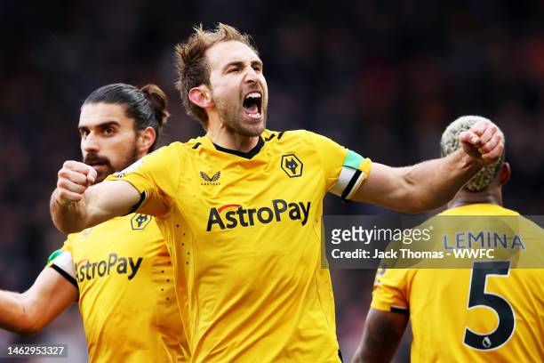 Craig Dawson of Wolverhampton Wanderers celebrates after scoring his team's second goal during the Premier League match between Wolverhampton...