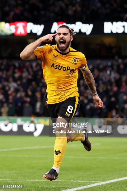 Ruben Neves of Wolverhampton Wanderers celebrates after scoring his team's third goal during the Premier League match between Wolverhampton Wanderers...