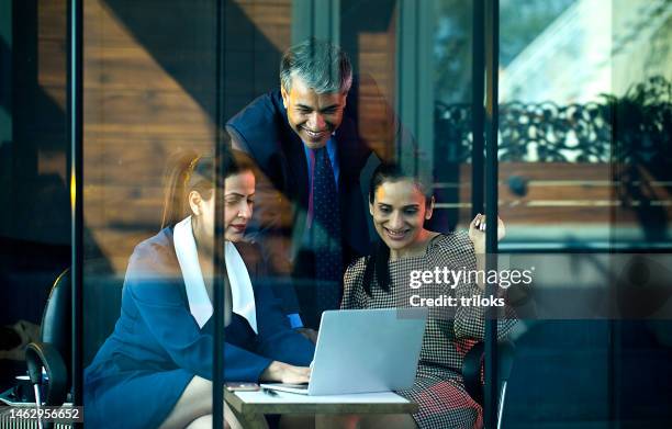 businessman and businesswomen discussion at cafe - indian colleague stock pictures, royalty-free photos & images