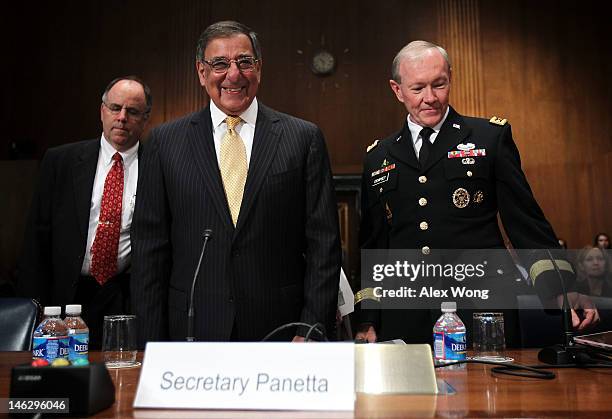 Secretary of Defense Leon Panetta and Chairman of the Joint Chiefs of Staff Gen. Martin Dempsey arrive for a hearing before the Senate Appropriations...