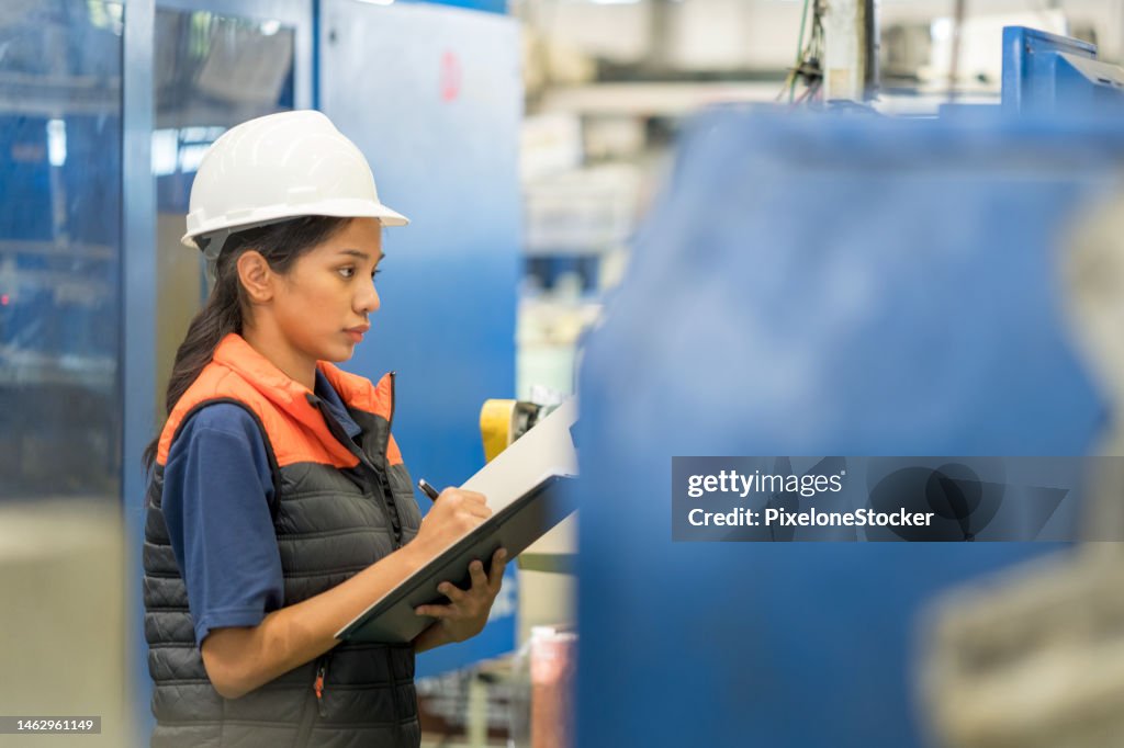 Process Engineer Woman Asian Women Engineer Working At Factory Doing Checklist At The Machine ...