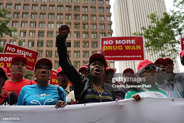 Marijuana legalization advocates and members of community groups attend a rally against marijuana arrests in front of One Police Plaza on June 13,...