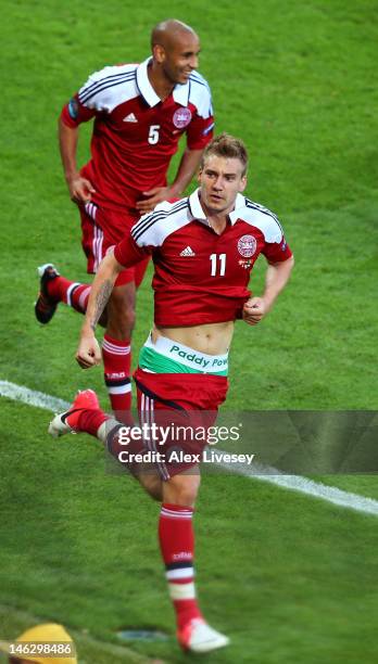 Nicklas Bendtner of Denmark celebrates scoring their second goal during the UEFA EURO 2012 group B match between Denmark and Portugal at Arena Lviv...