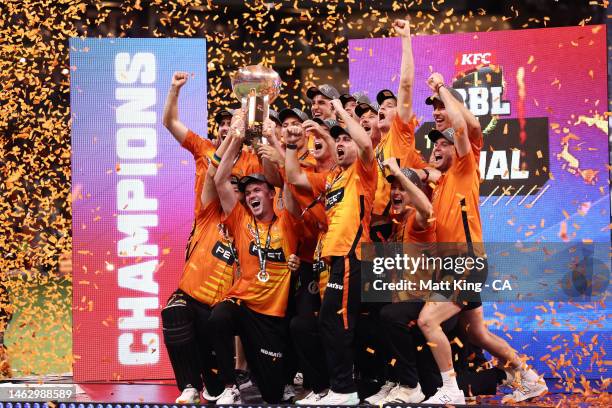 The Scorchers celebrate with the trophy after victory in the Men's Big Bash League Final match between the Perth Scorchers and the Brisbane Heat at...